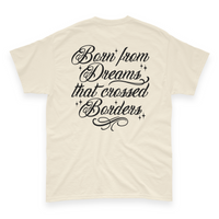 'Dreamers: Born From Dreams That Crossed Borders' Unisex T-Shirt - Ivory - Premium Cotton