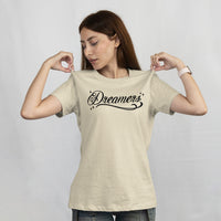 'Dreamers: Born From Dreams That Crossed Borders' Unisex T-Shirt - Ivory - Premium Cotton