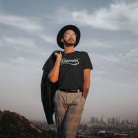 'Dreamers: Born From Dreams That Crossed Borders' Unisex T-Shirt - Black - Premium Cotton